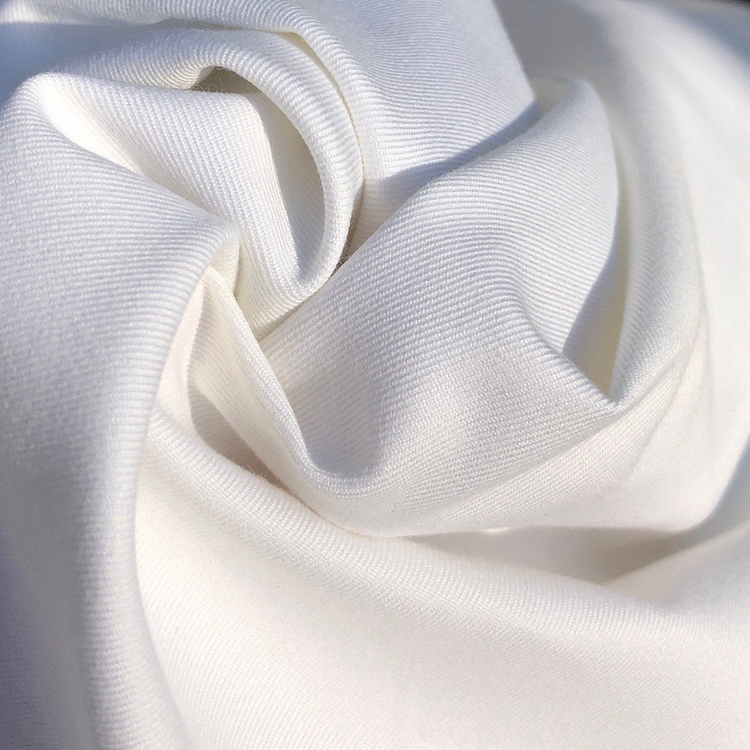 Loose weave cotton muslin fabric, medium-weight cream, off-white color with  horizontal black irregular contrast stitching, per yard PHA26